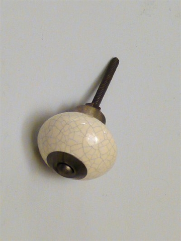 Cremehvid, marmoreret porcel�nsknop m. m�rkfortinnet metal, stor.