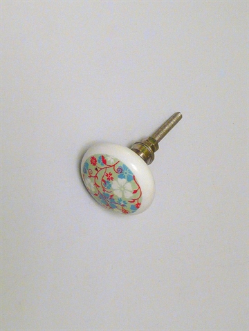 Hvid hv�lvet porcel�nsknop m. flerfarvede blomster p� lysegr�n bund og forkromet hals, mellemstr..